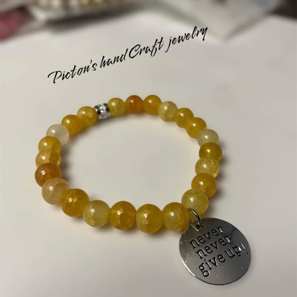 Yellow Beaded Bracelet with Silver Charm